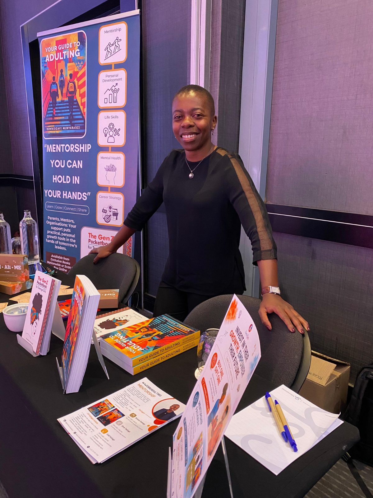 The book and mentorship table at a workshop